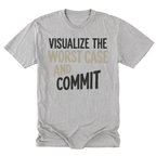 A light steel gray tall short-sleeve t-shirt with a graphic text print reading 'VISUALIZE THE WORST CASE AND COMMIT' in black and beige lettering, displayed flat against a white background.