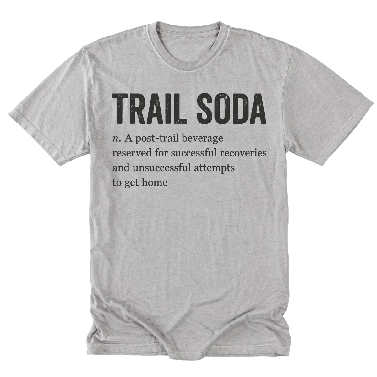 A light steel gray short-sleeve t-shirt with a black printed graphic on the front. The graphic features the text 'TRAIL SODA' in a bold serif font, followed by a dictionary-style definition: 'n.