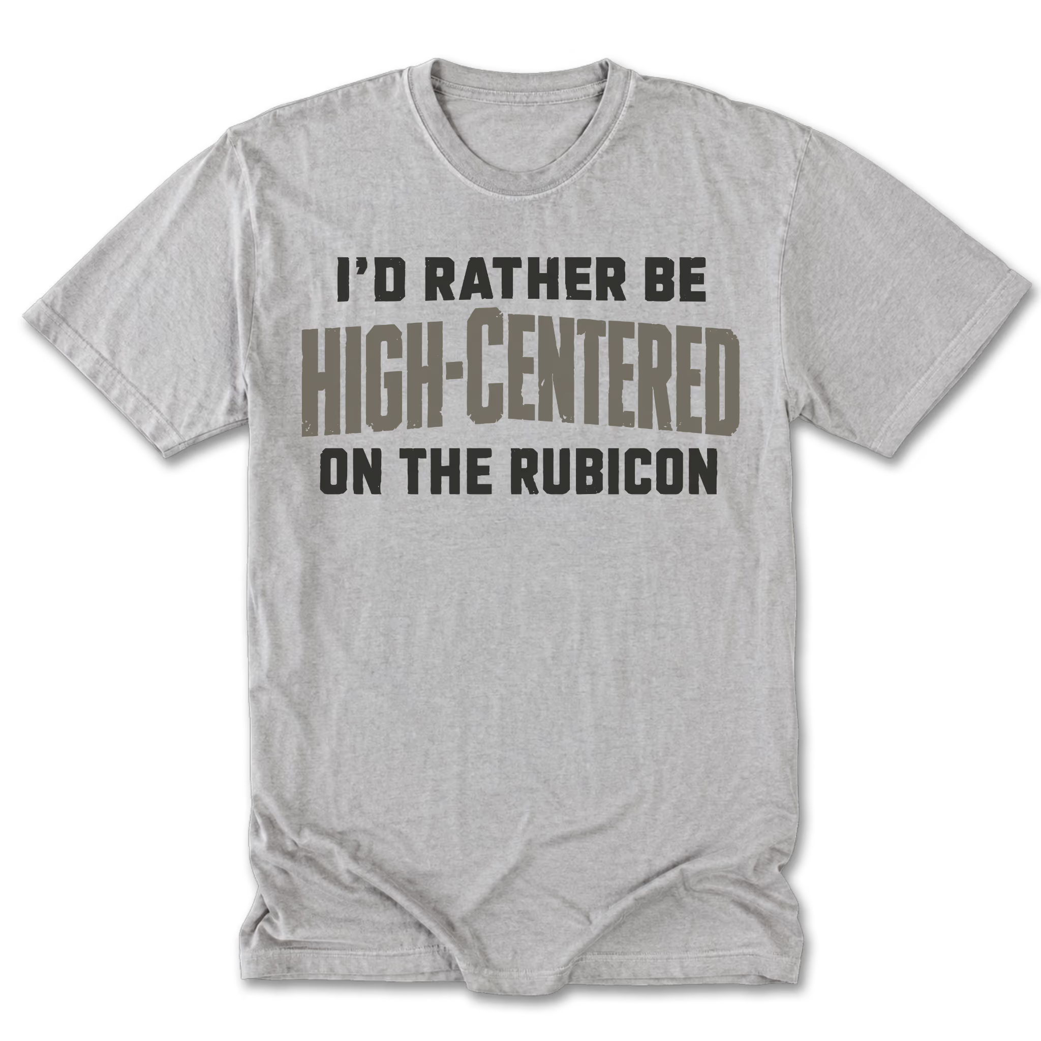 A light heather gray short-sleeve t-shirt with a humorous slogan printed on the front. The text reads 'I'D RATHER BE HIGH-CENTERED ON THE RUBICON' in black and brown block lettering.