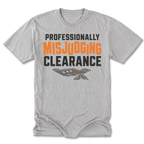 A light heather gray short-sleeve t-shirt with a graphic print on the front. The text reads 'PROFESSIONALLY MISJUDGING CLEARANCE' in black and orange lettering, with a small gray and orange ticket graphic below.
