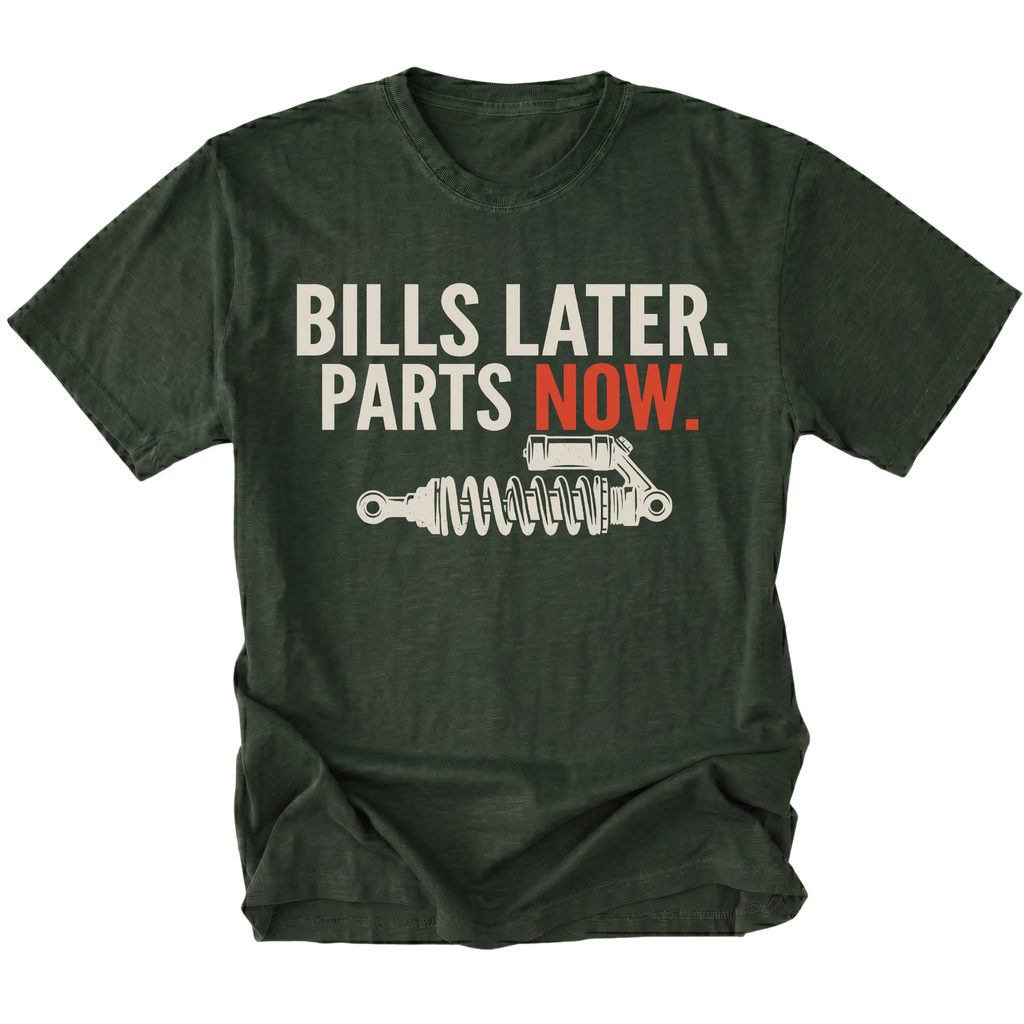 Moss t-shirt featuring Bills Later Parts Now design with suspension coilover graphic on front view by Trail Snark.