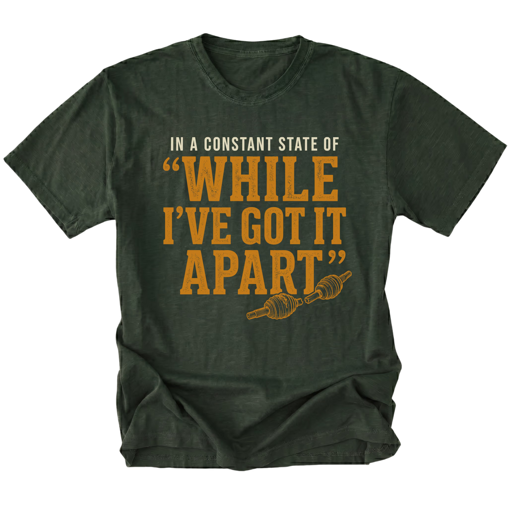 Moss T-shirt with a While I've Got It Apart off-road repair design shown from the front by Trail Snark.