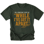 Moss T-shirt with a While I've Got It Apart off-road repair design shown from the front by Trail Snark.