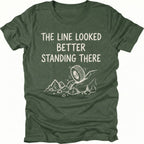Moss T-Shirt with hand-drawn tire and rocks graphic and text reading “The Line Looked Better Standing There” shown on front view by Trail Snark.