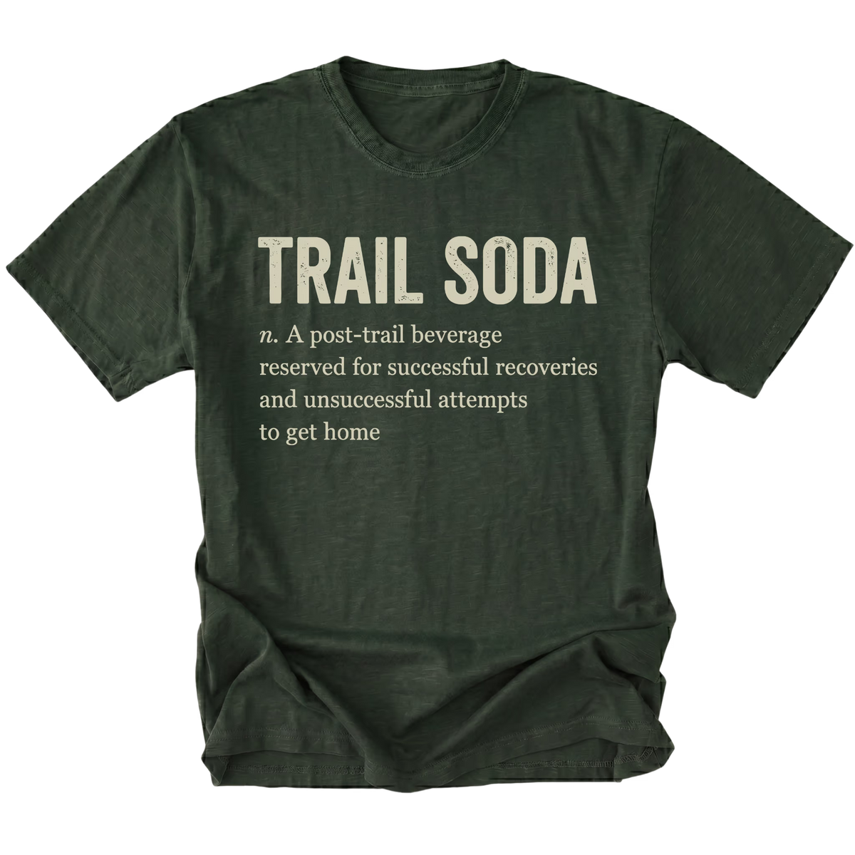 A moss green t-shirt with a humorous definition of 'Trail Soda' printed in a distressed cream-colored font on the front, displayed against a solid white background.
