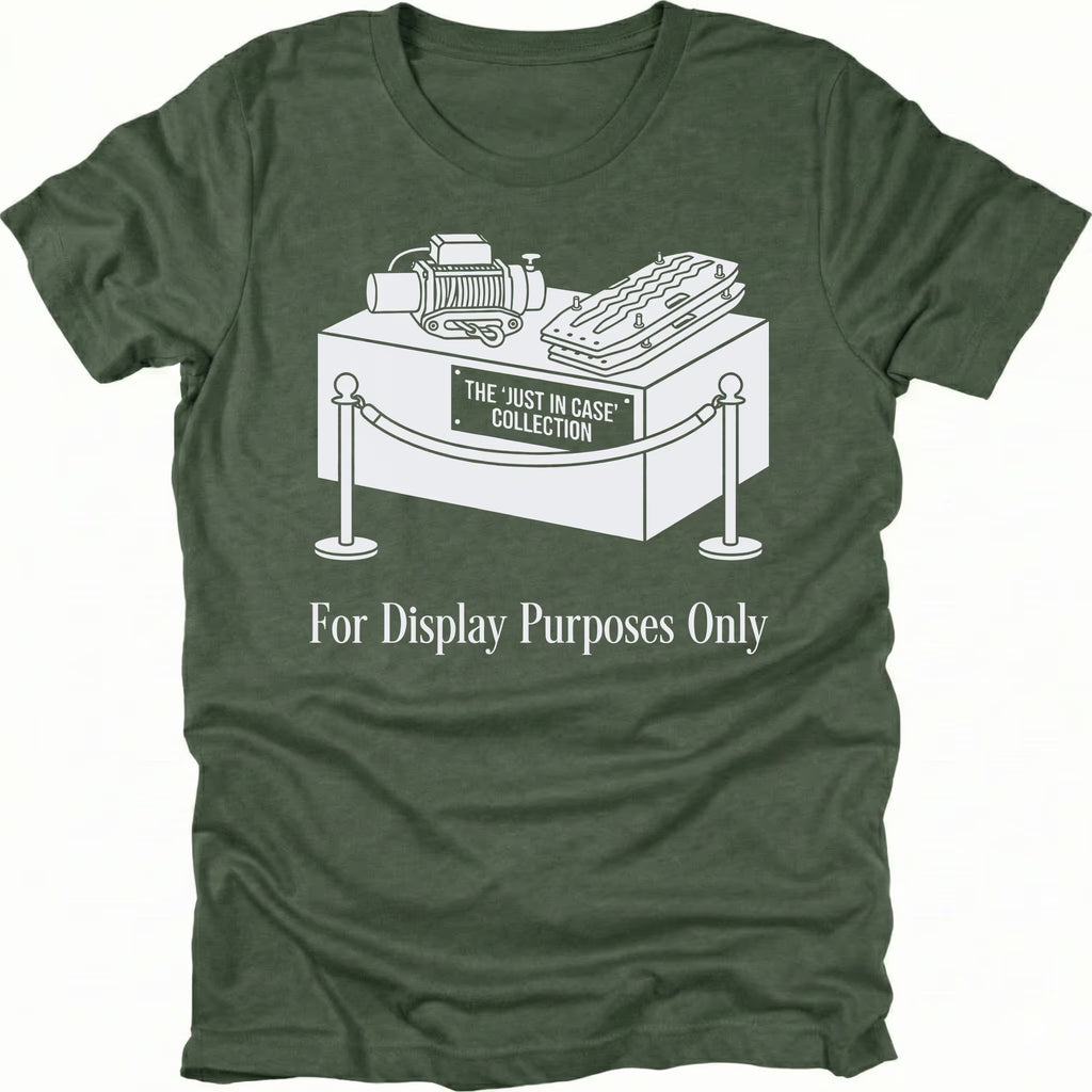 Moss t-shirt featuring a display stand graphic labeled the just in case collection with off-road gear and for display purposes only text shown from the front.
