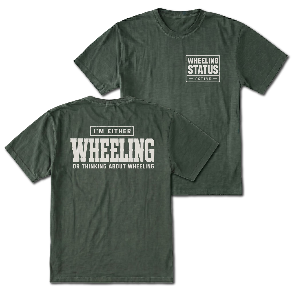 Moss T-shirt with I'm Either Wheeling Or Thinking About Wheeling back design and Wheeling Status front chest print by Trail Snark.