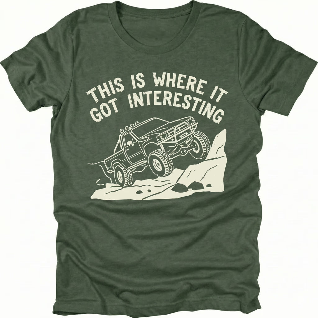 Moss T-Shirt with off-road truck climbing rocks and text reading “This Is Where It Got Interesting” shown on front view by Trail Snark.