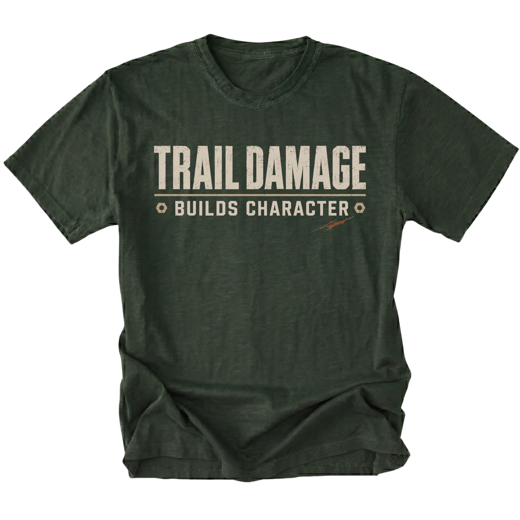 Moss T-shirt featuring the Trail Damage Builds Character design on the front by Trail Snark.