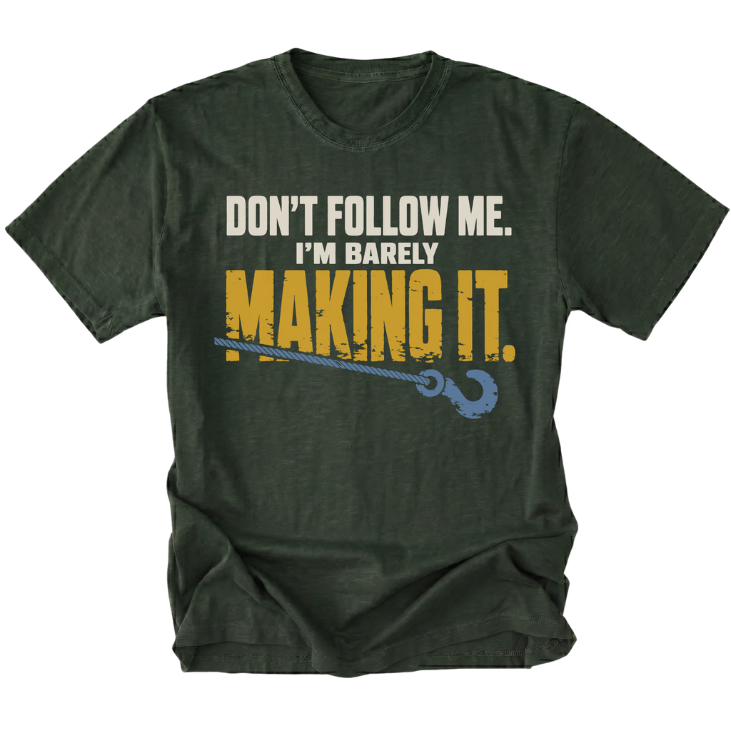 Moss T-shirt featuring the Barely Making It recovery hook design on the front by Trail Snark.