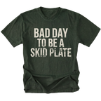 Moss t-shirt featuring bold bad day to be a skid plate text graphic shown from the front by Trail Snark.