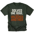 Moss T-Shirt with the Solved One Issue. Unlocked Another design shown in a front view by Trail Snark.