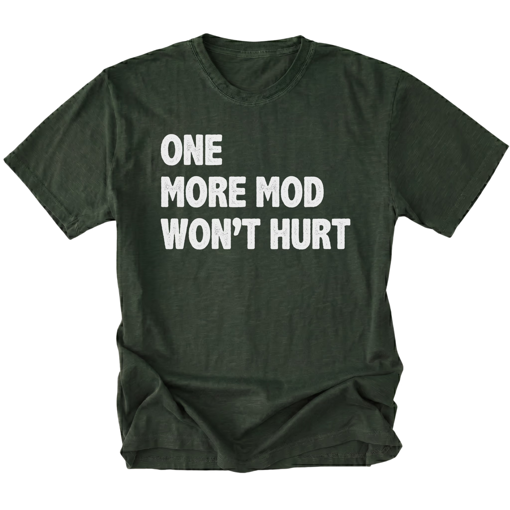 Moss T-Shirt with bold white “One More Mod Won’t Hurt” text shown on front view by Trail Snark.