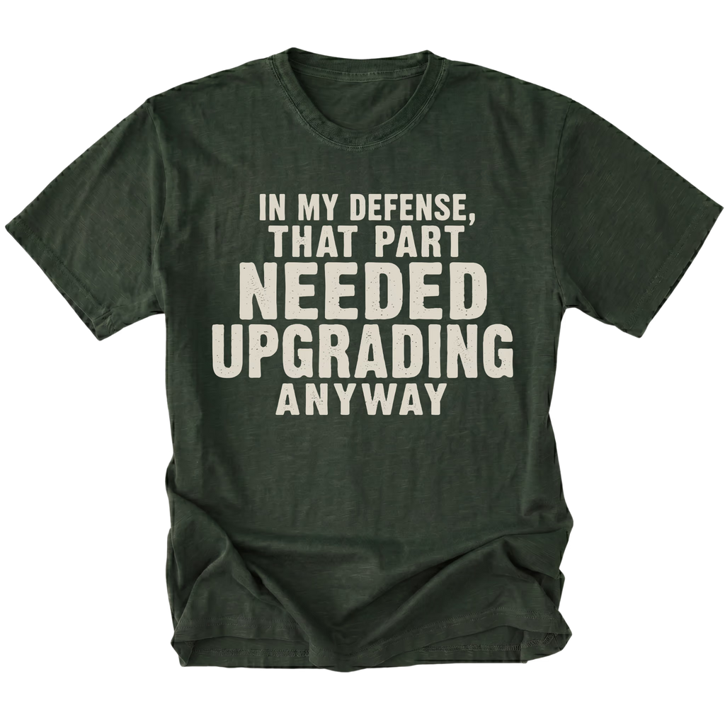 Moss t-shirt featuring the Needed Upgrading design on the front by Trail Snark.