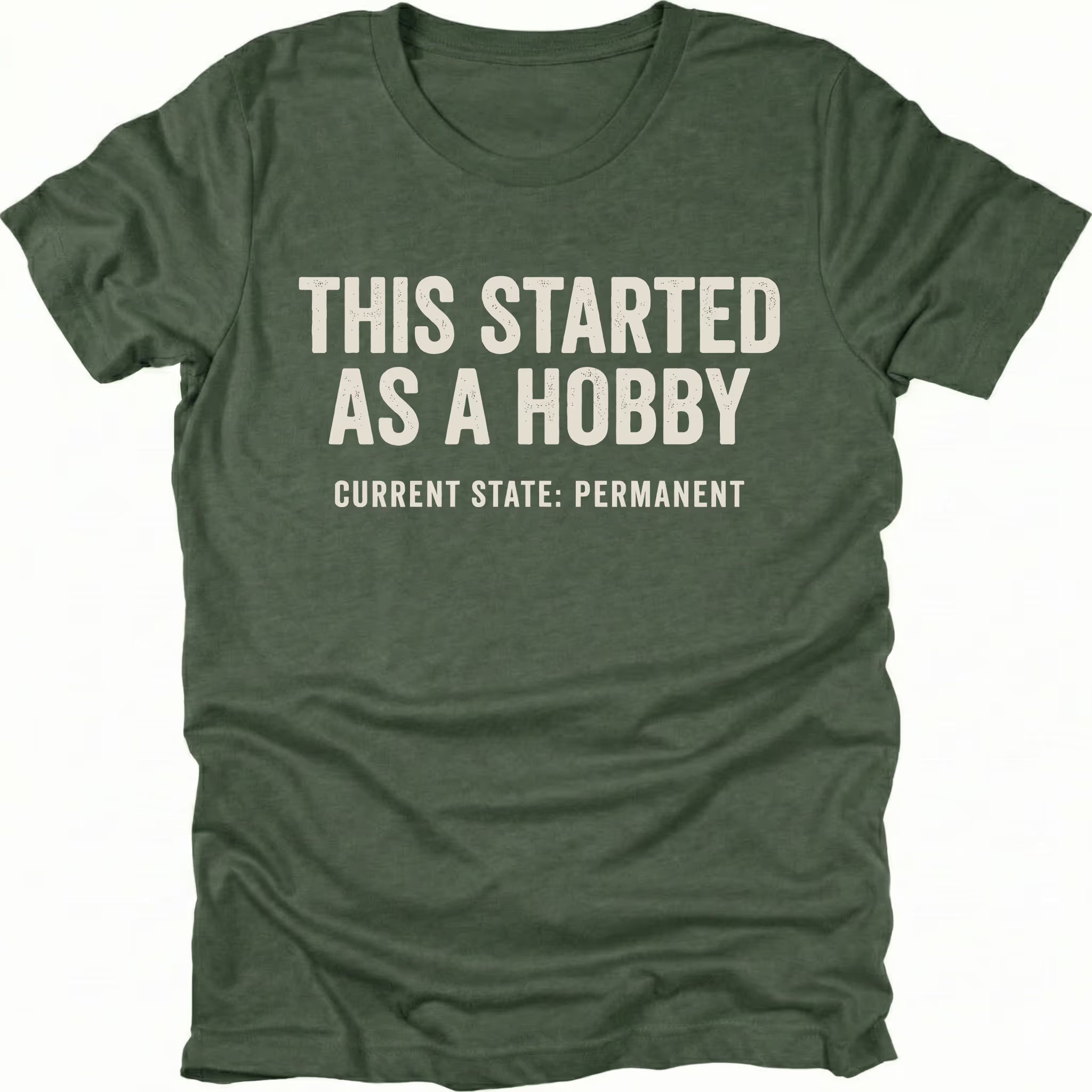 Moss t-shirt with text reading “This Started As a Hobby – Current State: Permanent” displayed on the front.