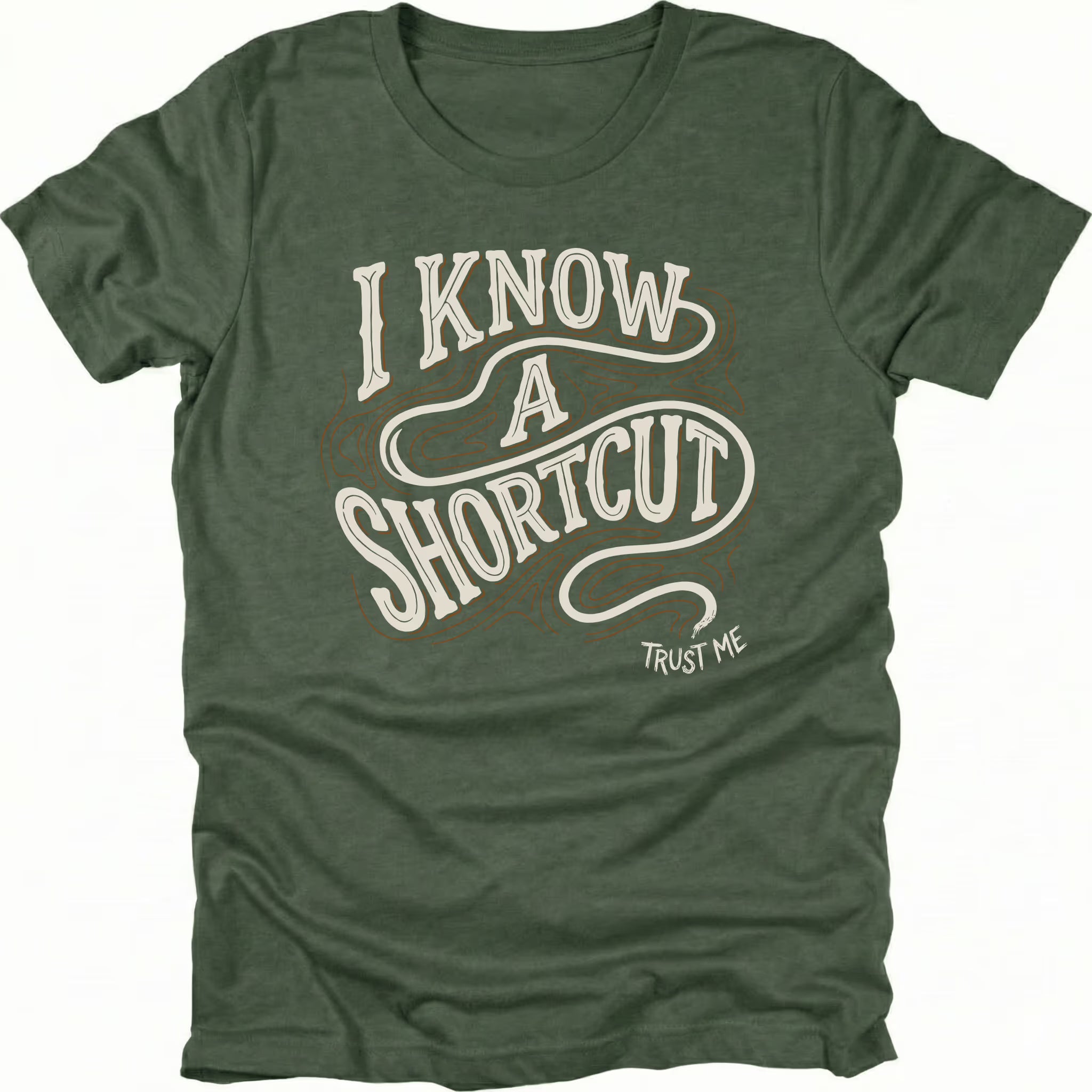 Moss t-shirt with vintage typography reading I Know A Shortcut Trust Me with winding trail lines, front view by Trail Snark.