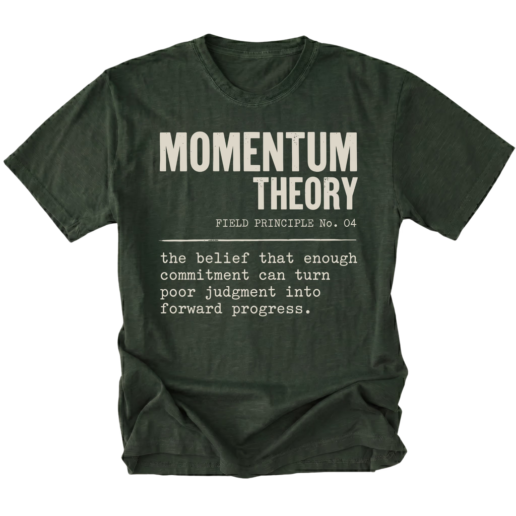 A moss green t-shirt with a humorous physics-themed graphic print on the front. The graphic reads 'MOMENTUM THEORY' in bold white letters, followed by 'FIELD PRINCIPLE No.