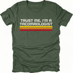 Moss t-shirt with retro stripes and the phrase “Trust Me, I’m a Tacomaologist” printed on the front by Trail Snark.