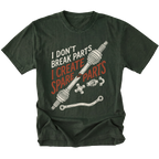 A dark forest green graphic t-shirt featuring a crossed steering column and control arm illustration with the text 'I DON'T BREAK PARTS I CREATE SPARE PARTS' in white and orange-red lettering, displayed on a solid white background.