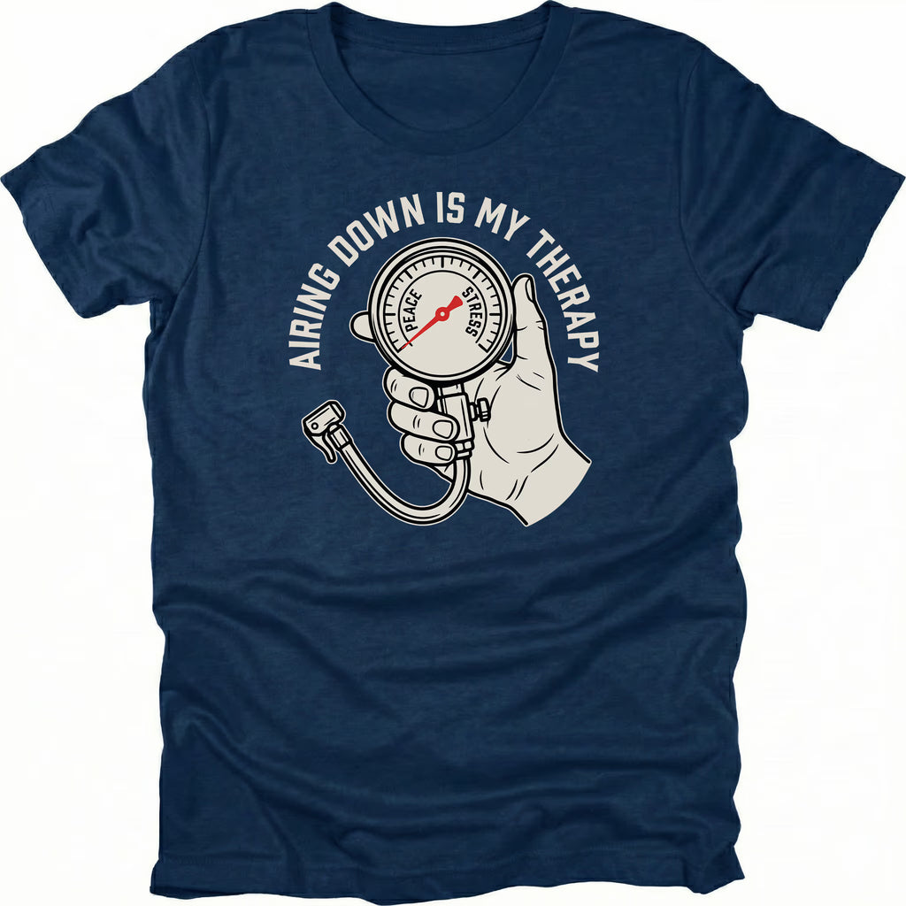 Navy t-shirt featuring an airing down is my therapy tire pressure gauge graphic shown from the front by Trail Snark.