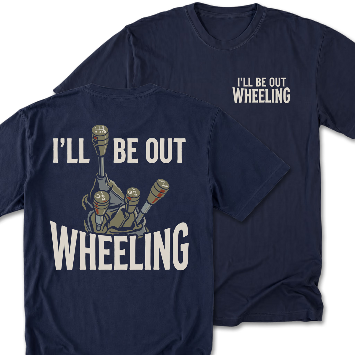 Two navy blue t-shirts shown on a white background, with the back design of one shirt in front and the front chest design of the other behind. The back graphic features the text 'I’LL BE OUT WHEELING' 