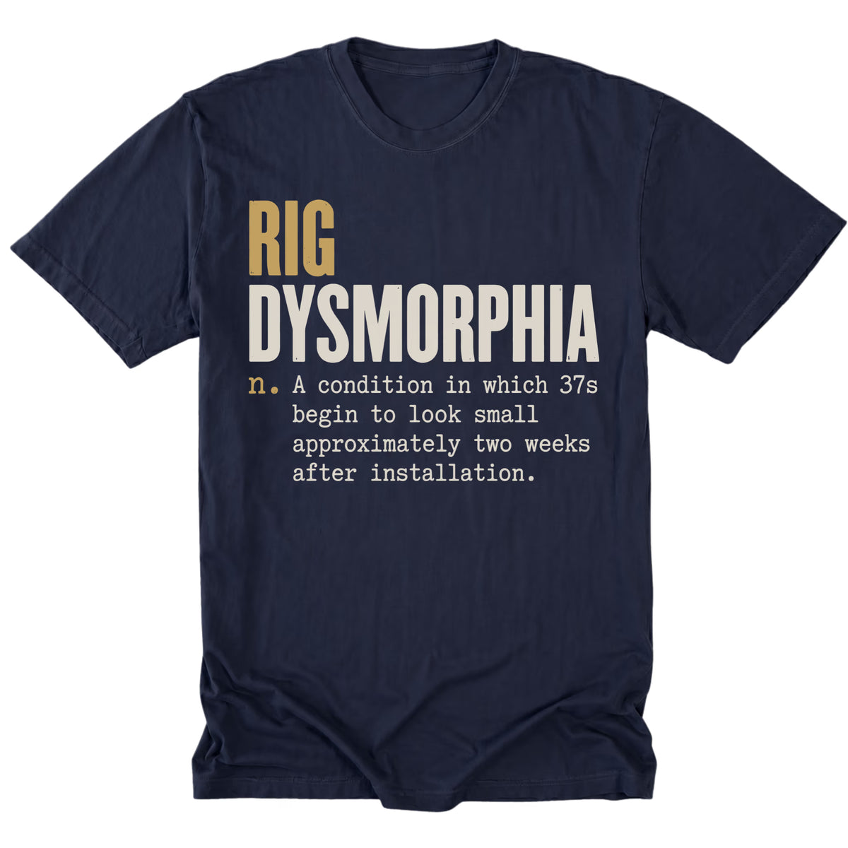 A navy blue short-sleeve t-shirt with a humorous graphic print on the front reading 'RIG DYSMORPHIA' followed by a dictionary-style definition in white and mustard yellow text, shown against a plain white background.