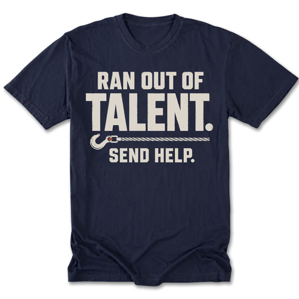 A navy blue short-sleeve t-shirt with a white graphic print that reads 'RAN OUT OF TALENT. SEND HELP.