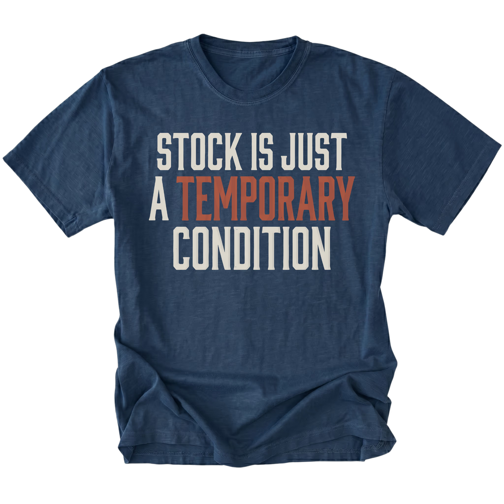 A navy blue short-sleeve t-shirt with a distressed graphic text reading 'STOCK IS JUST A TEMPORARY CONDITION' in white and orange lettering, displayed on a clean white background.