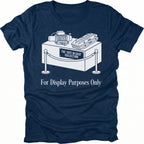 Navy t-shirt featuring a display stand graphic labeled the just in case collection with off-road gear and for display purposes only text shown from the front.