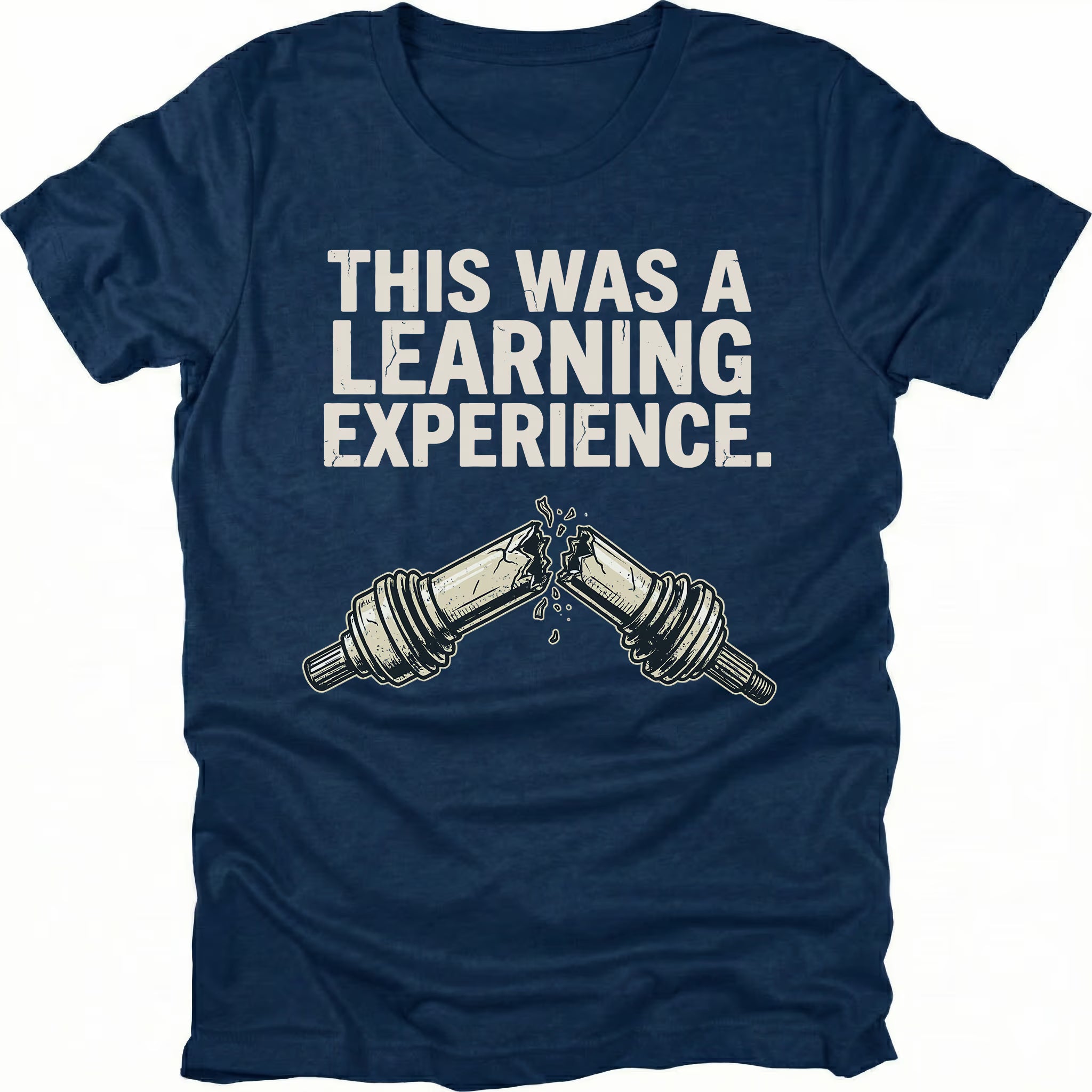 Navy t-shirt with text reading “This Was a Learning Experience” above an illustration of a broken axle or CV joint, shown on the front.