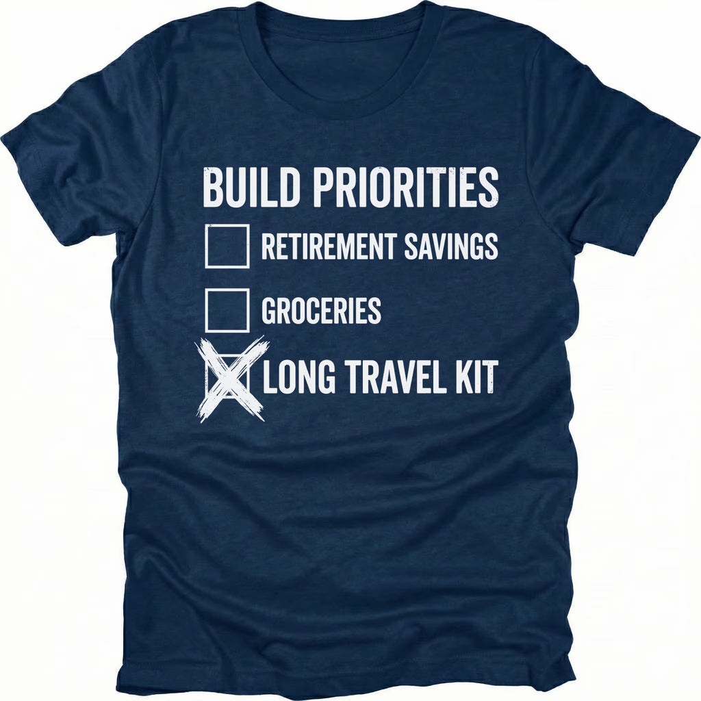 Navy T-Shirt featuring Build Priorities checklist highlighting long travel kit on front view by Trail Snark.