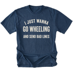 A navy blue short-sleeve t-shirt with a distressed cream-colored graphic text that reads 'I JUST WANNA GO WHEELING AND SEND BAD LINES' on a solid white background.