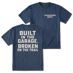 Navy T-shirt with Shakedown Dept front print and Built in the Garage Broken on the Trail back design shown front and back by Trail Snark.