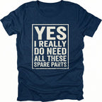 Navy t-shirt with bold distressed text reading “Yes I Really Do Need All These Spare Parts” in a boxed layout on the front by Trail Snark.