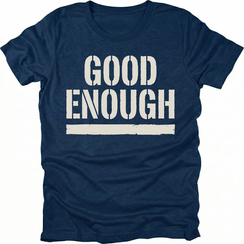Navy t-shirt featuring bold distressed text reading Good Enough with an underline displayed on the front.