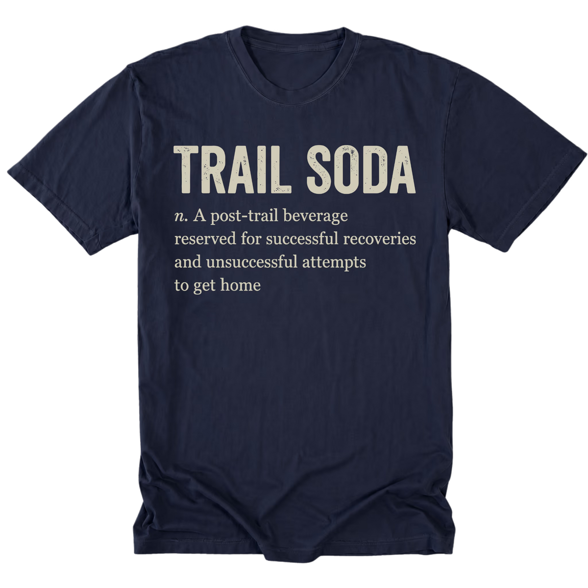 A navy blue short-sleeve t-shirt with a humorous dictionary-style definition printed on the front. The text reads 'TRAIL SODA' in large cream-colored letters, followed by 'n.