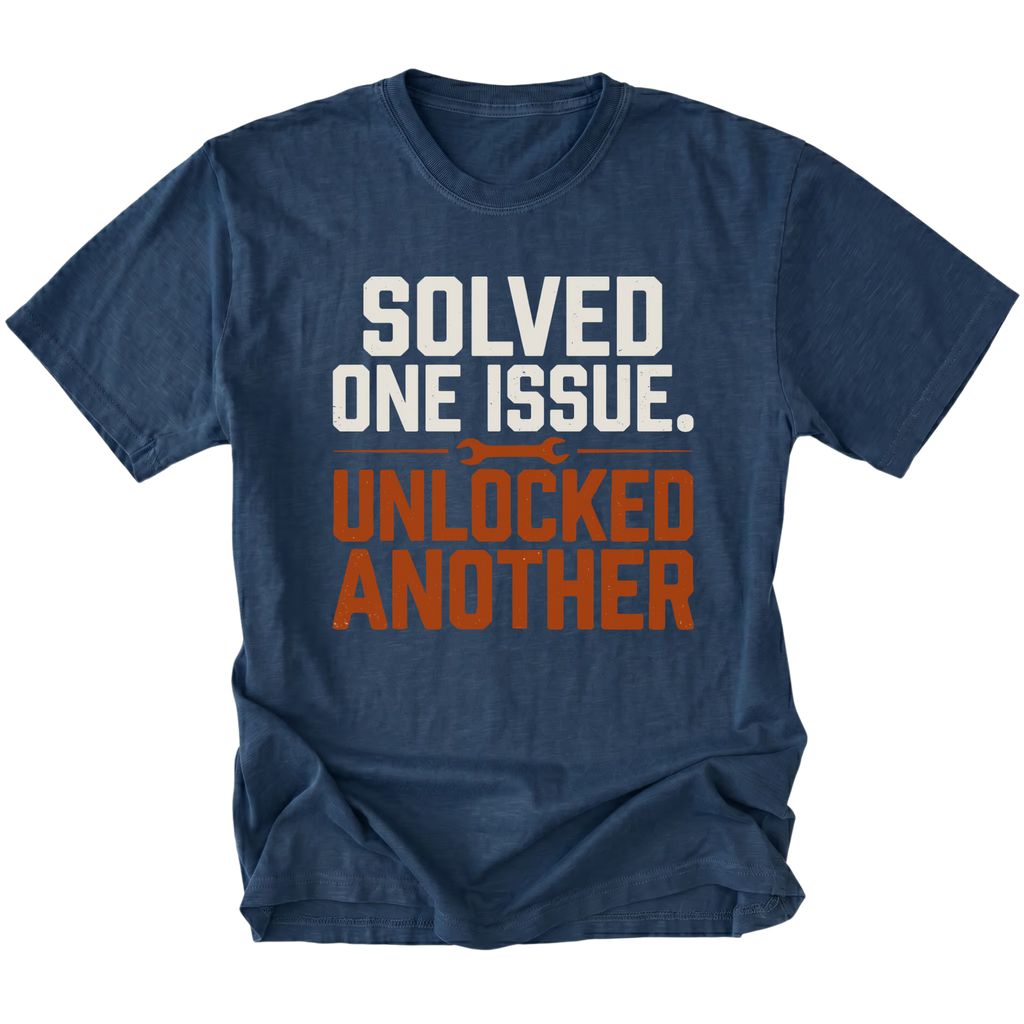 Navy T-Shirt with the Solved One Issue. Unlocked Another design shown in a front view by Trail Snark.