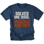 Navy T-Shirt with the Solved One Issue. Unlocked Another design shown in a front view by Trail Snark.