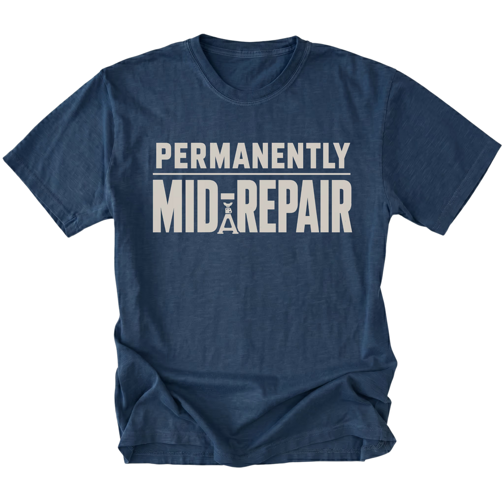 Navy T-Shirt featuring the Permanently Mid-Repair design shown in front view by Trail Snark.