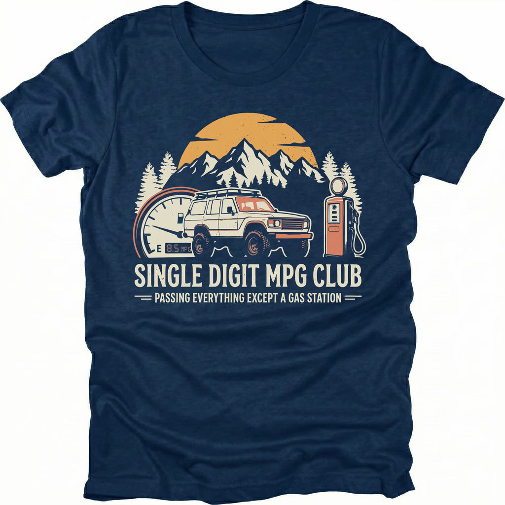Navy t-shirt featuring an offroad vehicle, mountains, fuel gauge, and gas pump graphic with text reading “Single Digit MPG Club – Passing Everything Except a Gas Station.”