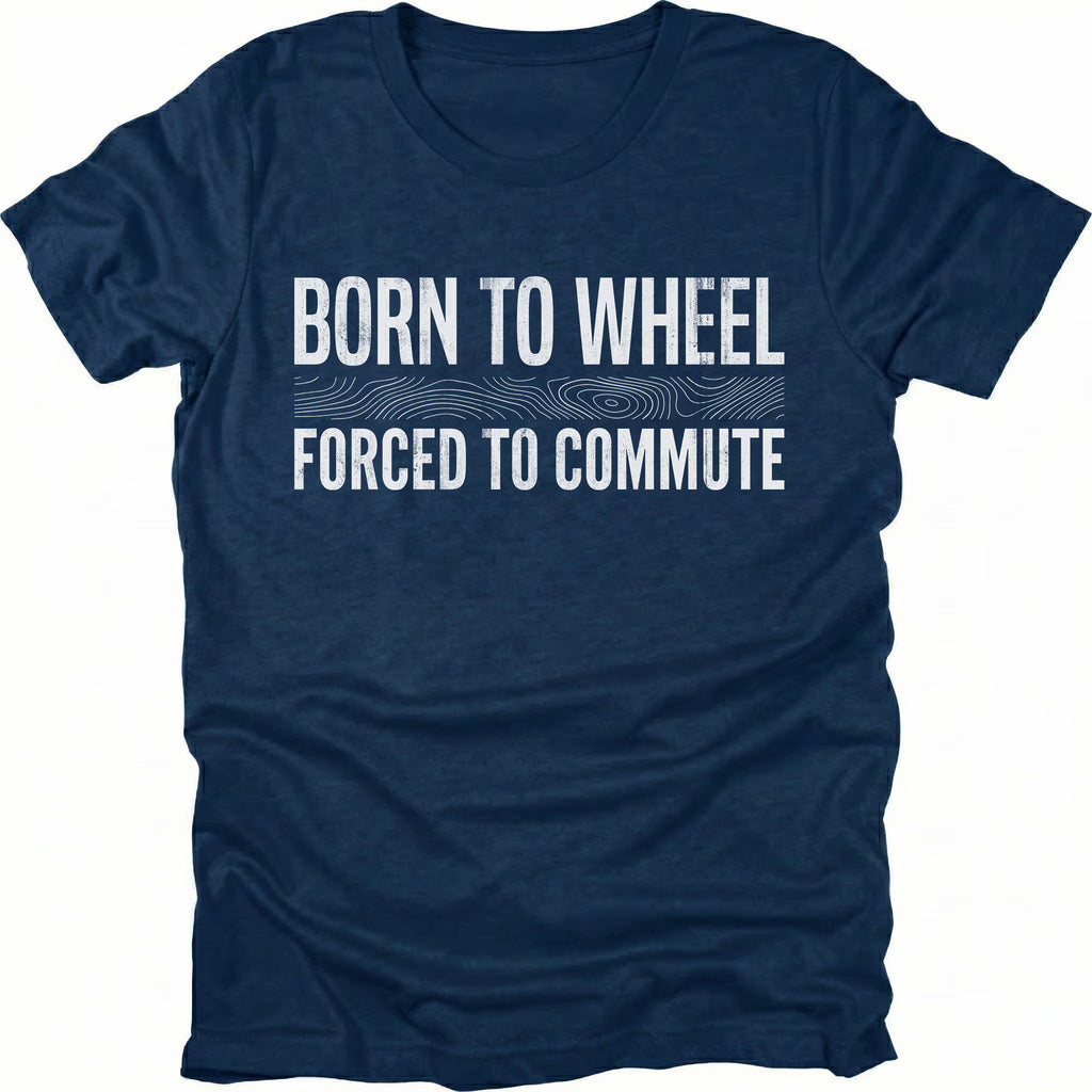 Navy t-shirt featuring born to wheel forced to commute text graphic shown from the front by Trail Snark.