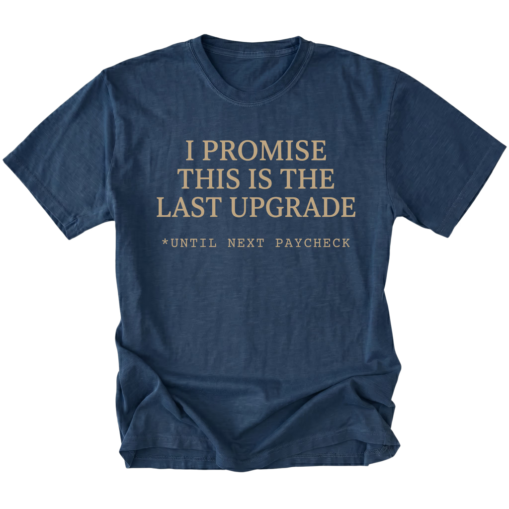 Navy t-shirt with I Promise This Is The Last Upgrade text design shown front view by Trail Snark.