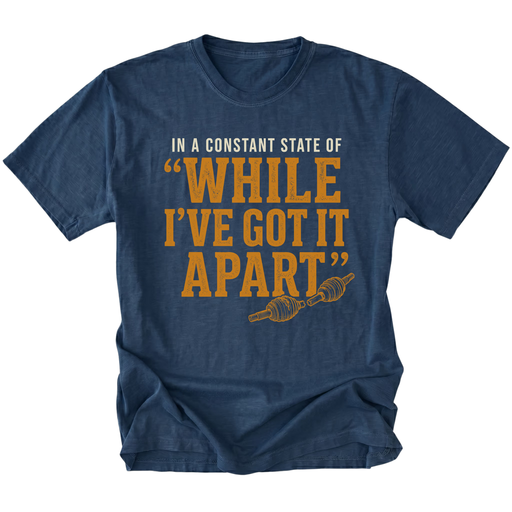 Navy T-shirt with a While I've Got It Apart off-road repair design shown from the front by Trail Snark.