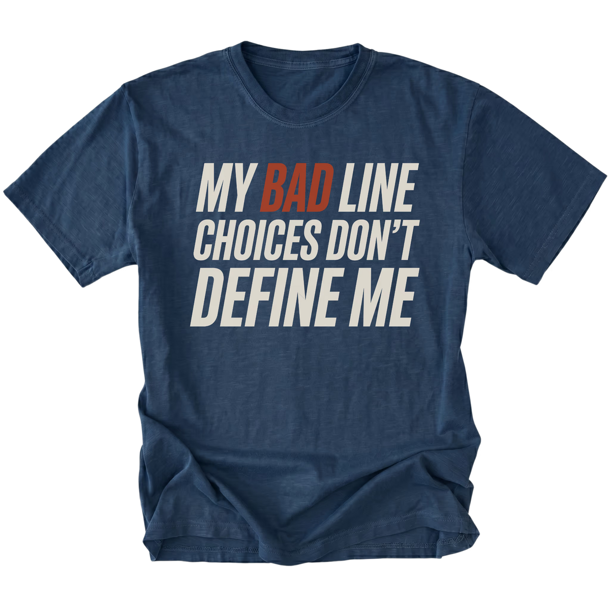 Navy blue crewneck T-shirt shown from the front with large slanted off-white lettering reading "MY BAD LINE CHOICES DON'T DEFINE ME"; "BAD" is highlighted in rust orange.