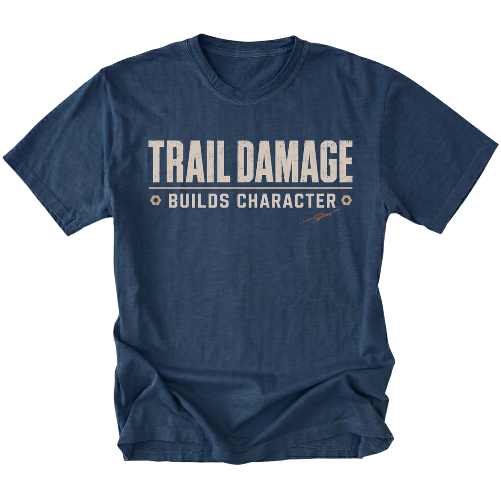 Navy T-shirt featuring the Trail Damage Builds Character design on the front by Trail Snark.