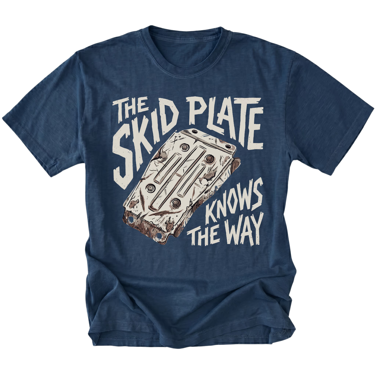 A navy blue short-sleeve t-shirt with a graphic print of a car engine block and the text 'THE SKID PLATE KNOWS THE WAY' in a distressed white font, displayed on a clean white background.