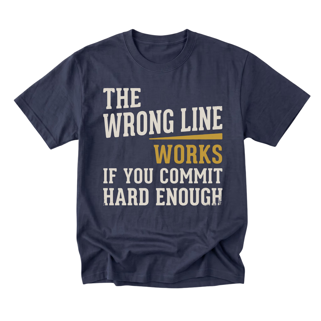 A navy blue short-sleeve t-shirt with a distressed graphic print on the front. The text reads 'THE WRONG LINE WORKS IF YOU COMMIT HARD ENOUGH' in cream and mustard yellow lettering, displayed against a clean white background.