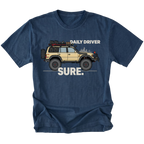 Navy t-shirt featuring a built off-road vehicle with daily driver sure text graphic shown from the front by Trail Snark.
