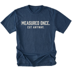 Navy t-shirt with white text reading Measured Once. Cut Anyway., front view.