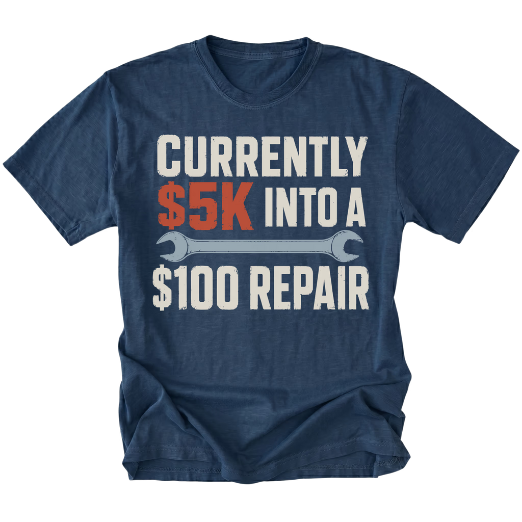 Navy T-Shirt featuring the five-thousand-dollar repair design on the front by Trail Snark.